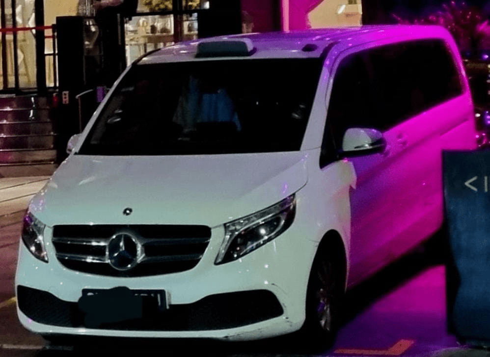 White mercedes mini bus